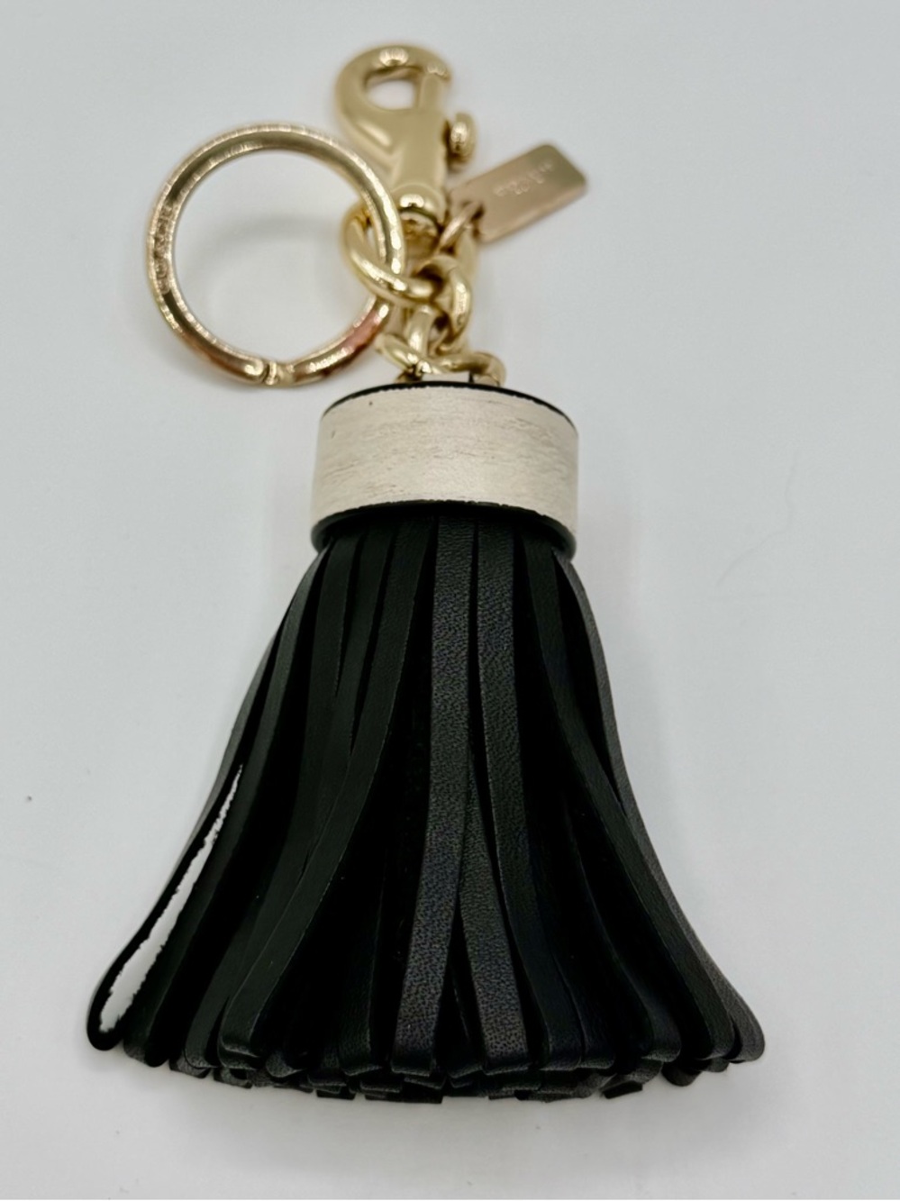COACH Black Tassel Charm